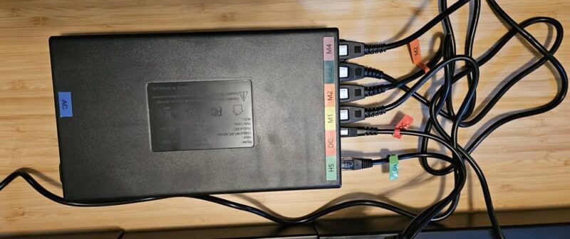 Cables connected under FlexiSpot E7 Plus Max Standing Desk.