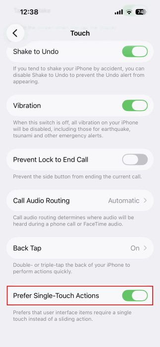 Enabling "Prefer Single-Touch Actions" in iPhone Accessibility settings. 