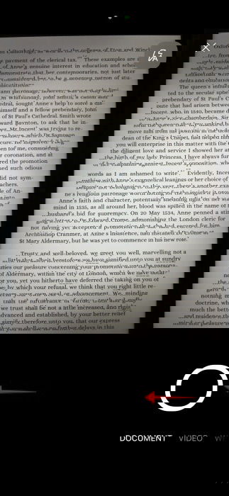 Tapping shutter button to scan document in OneDrive app on iPhone. 